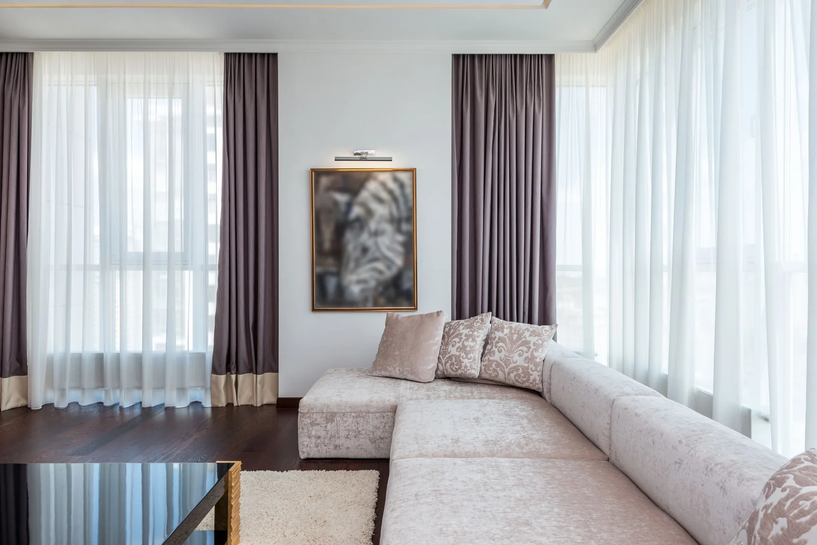 A bright living room with large windows