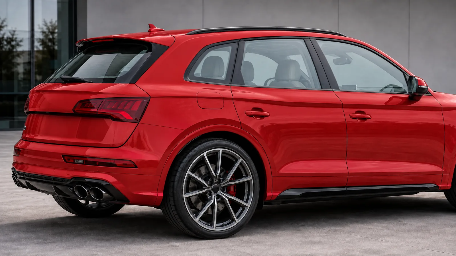 An Audi SQ5 with clear glass beside the same car with 50% Union window tint